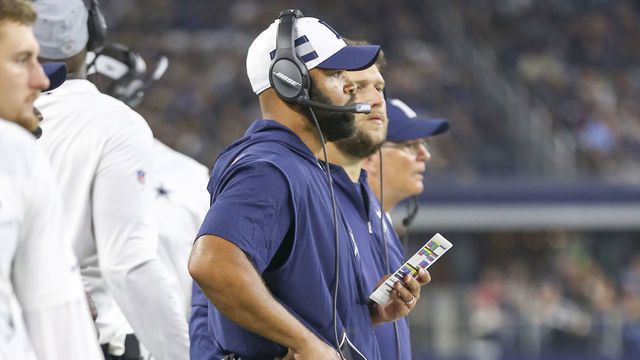 ARLINGTON, TX - AUGUST 18: Dallas Cowboys defensive coach Kris Richard watches from the sidelines during the game between the Dallas Cowboys and the Cincinnati Bengals on August 18, 2018 at AT&T Stadium in Arlington, Texas.Cincinnati defeats Dallas 21-13.