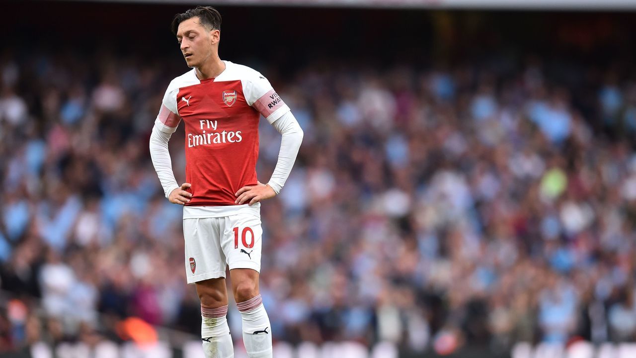 Arsenal's German midfielder Mesut Ozil reacts during the English Premier League football match between Arsenal and Manchester City at the Emirates Stadium in London on August 12, 2018.