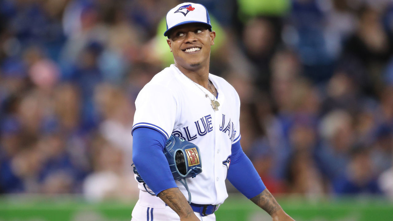 TORONTO, ON - MAY 8: Marcus Stroman #6 of the Toronto Blue Jays smiles in the second inning during MLB game action against the Seattle Mariners at Rogers Centre on May 8, 2018 in Toronto, Canada.