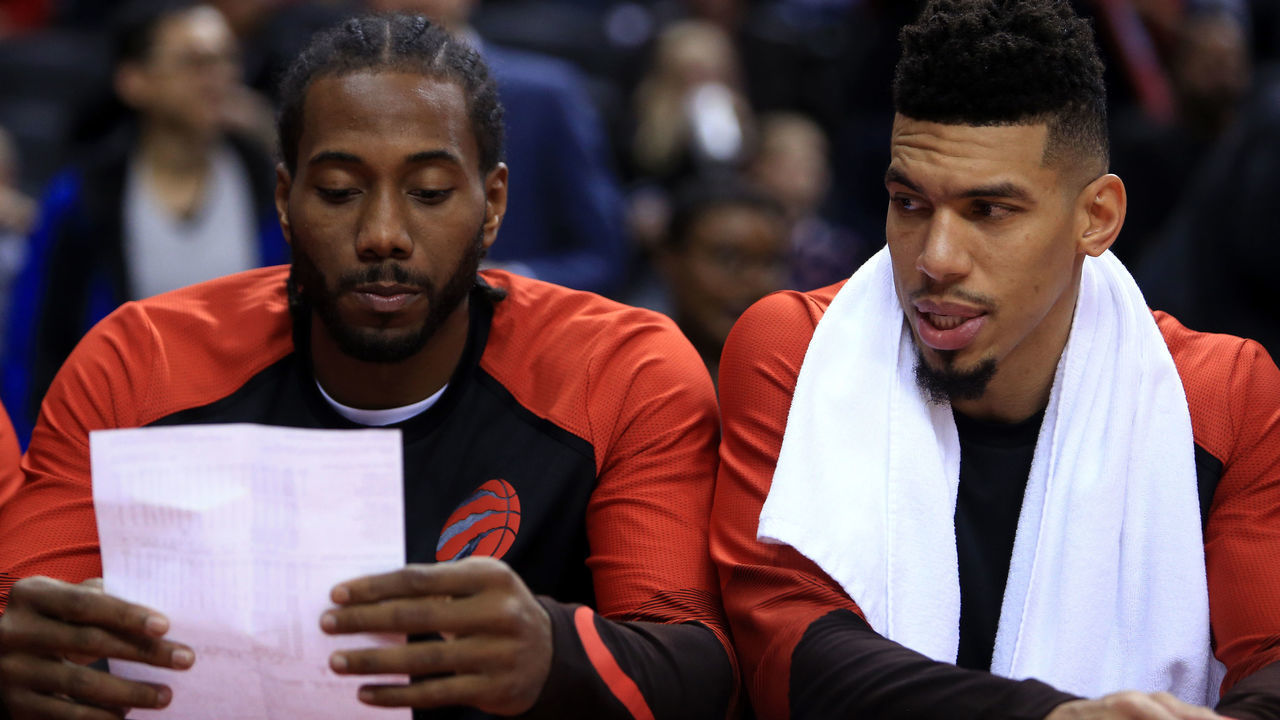 TORONTO, ON - OCTOBER 5: Kawhi Leonard #2 and Danny Green #14 of the Toronto Raptors sit on the bench reading the half time stats during the second half of an NBA preseason game against Melbourne United at Scotiabank Arena on October 5, 2018 in Toronto, Canada.