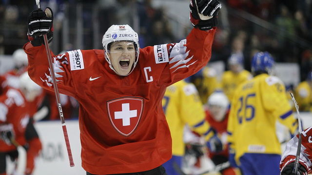 VICTORIA , BC - JANUARY 2: Nando Eggenberger #22 of Switzerland celebrates a 2-0 win over Sweden following a quarter-final game at the IIHF World Junior Championships at the Save-on-Foods Memorial Centre on January 2, 2019 in Victoria, British Columbia, Canada.