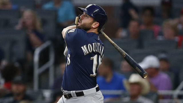 ATLANTA, GA - AUGUST 10: Third baseman Mike Moustakas #18 of the Milwaukee Brewers bats during the game against the Atlanta Braves at SunTrust Park on August 10, 2018 in Atlanta, Georgia.