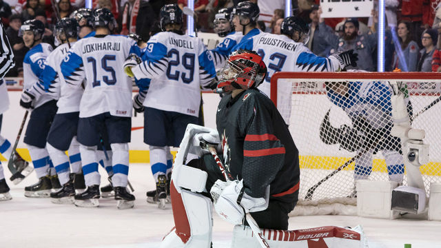 VANCOUVER, BC - JANUARY 2: Goalie Michael Dipietro #1 of Canada looks up at the big screen dejectedly as team Finland celebrate after winning to lose 2-1 in overtime in Quarterfinal hockey action of the 2019 IIHF World Junior Championship on January, 2, 2019 at Rogers Arena in Vancouver, British Columbia, Canada.
