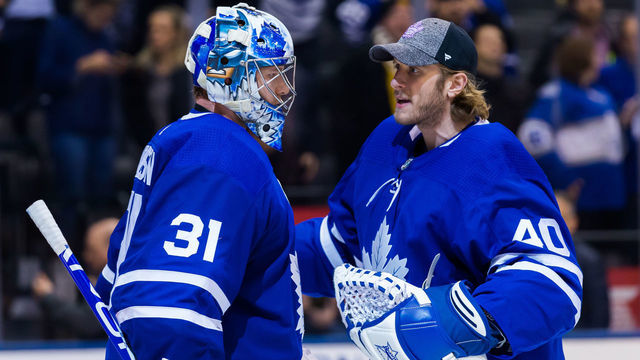 TORONTO, ON - NOVEMBER 26: Garret Sparks #40 of the Toronto Maple Leafs congratulates Frederik Andersen #31 after defeating the Boston Bruins at the Scotiabank Arena on November 26, 2018 in Toronto, Ontario, Canada.