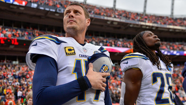 DENVER, CO - DECEMBER 30: Quarterback Philip Rivers #17 of the Los Angeles Chargers stands during the national anthem before a game against the Denver Broncos at Broncos Stadium at Mile High on December 30, 2018 in Denver, Colorado.