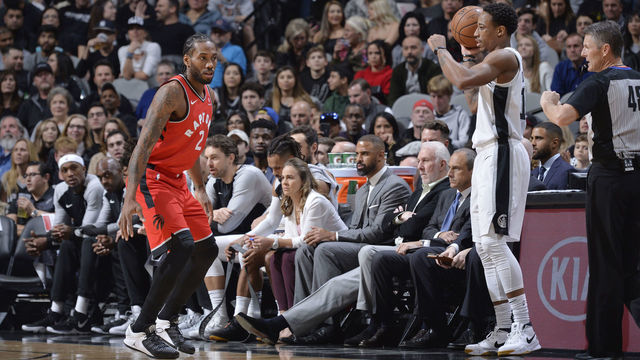SAN ANTONIO, TX - JANUARY 3: DeMar DeRozan #10 of the San Antonio Spurs handles the ball against Kawhi Leonard #2 of the Toronto Raptors on January 3, 2019 at the AT&T Center in San Antonio, Texas. Mandatory Copyright Notice: Copyright 2019 NBAE (Photos by Mark Sobhani/NBAE via Getty Images)