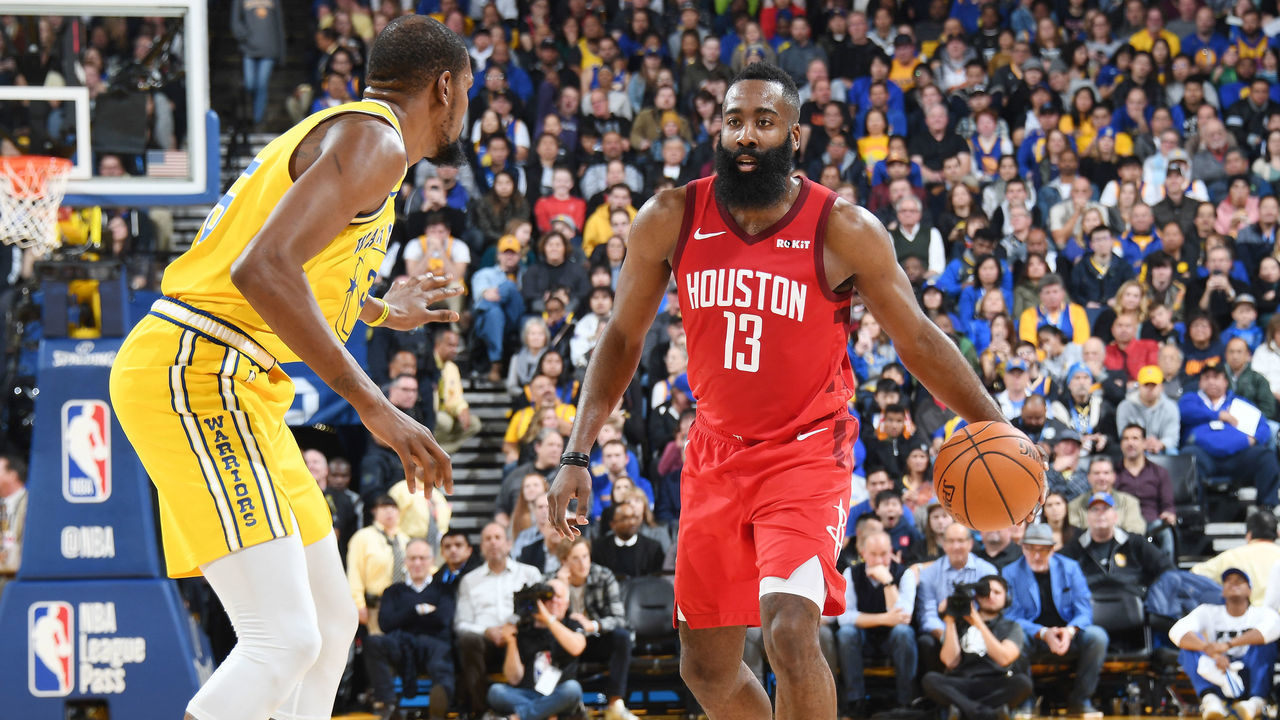 OAKLAND, CA - JANUARY 3: James Harden #13 of the Houston Rockets handles the ball against Kevin Durant #35 of the Golden State Warriors on January 3, 2019 at ORACLE Arena in Oakland, California. NOTE TO USER: User expressly acknowledges and agrees that, by downloading and or using this photograph, user is consenting to the terms and conditions of Getty Images License Agreement. Mandatory Copyright Notice: Copyright 2019 NBAE