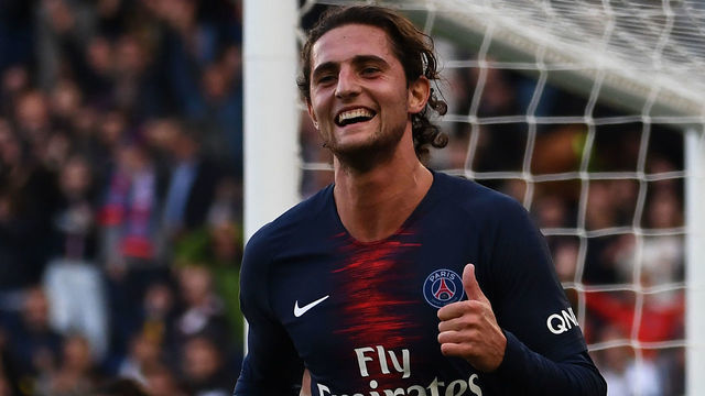 Paris Saint-Germain's French midfielder Adrien Rabiot celebrates after scoring his team's second goal during the French L1 football match between Paris Saint-Germain (PSG) and Amiens at the Parc des Princes stadium in Paris on October 20, 2018.