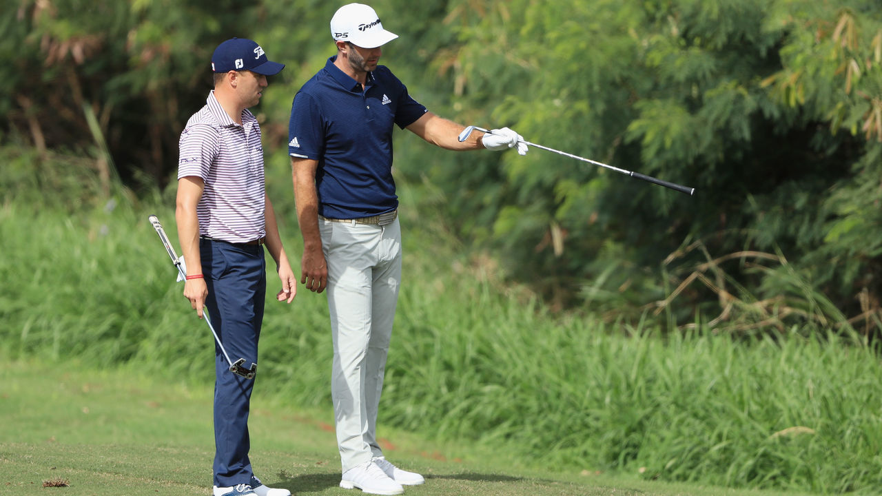 LAHAINA, HI - JANUARY 04: Justin Thomas and Dustin Johnson of the United States stand on the fourth hole during the second round of the Sentry Tournament of Champions at the Plantation Course at Kapalua Golf Club on January 4, 2019 in Lahaina, Hawaii.