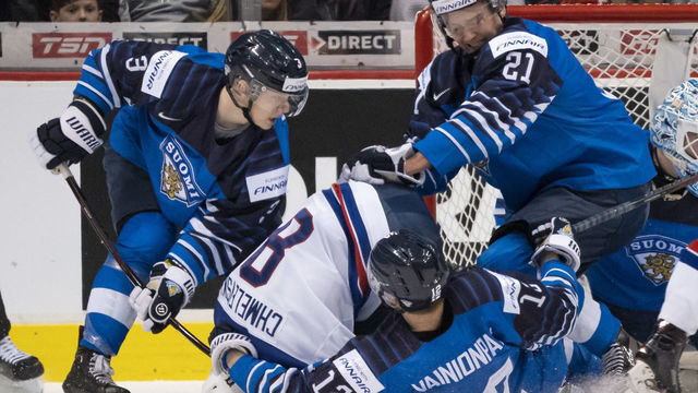 VANCOUVER, BC - JANUARY 5: Sasha Chmelevski #8 of the United States gets tangled up with Otto Latvala #21, Toni Utunen #3 and Samuli Vainionpaa #12 of Finland in Gold Medal hockey action of the 2019 IIHF World Junior Championship on January, 5, 2019 at Rogers Arena in Vancouver, British Columbia, Canada.