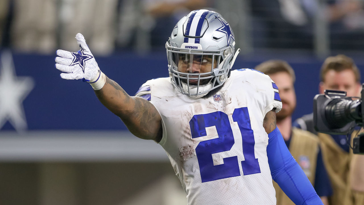 ARLINGTON, TX - JANUARY 05: Dallas Cowboys running back Ezekiel Elliott (21) signals first down after a long run during the NFC wildcard playoff game between the Seattle Seahawks and Dallas Cowboys on January 5, 2019 at AT&T Stadium in Arlington, TX.