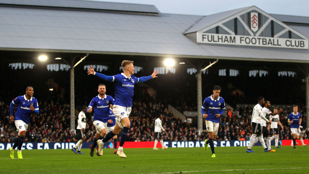 LONDON, ENGLAND - JANUARY 06: Sam Surridge of Oldham Athletic celebrates scoring his teams first goal during the FA Cup third round match between Fulham FC and Oldham Athletic AFC at Craven Cottage on January 6, 2019 in London, United Kingdom.