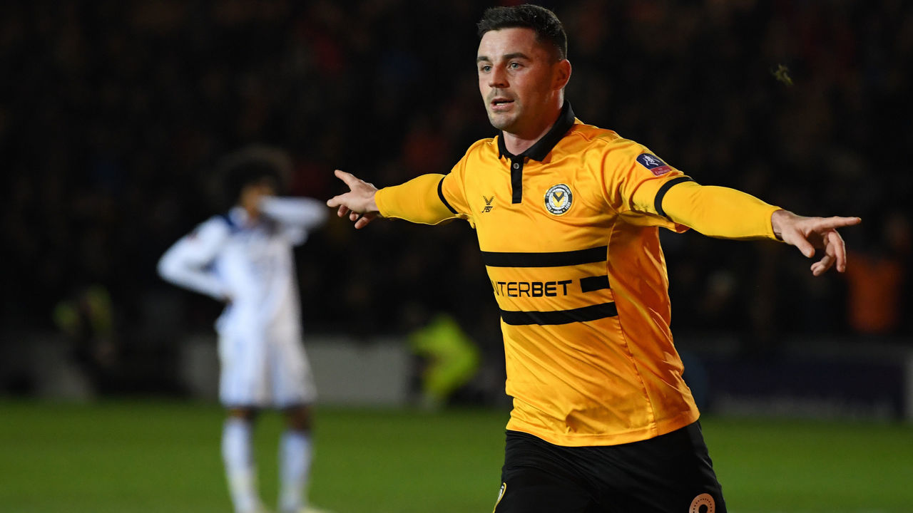 NEWPORT, WALES - JANUARY 06: Padraig Amond of Newport County celebrates after scoring his team's second goal from the penalty spot during the FA Cup Third Round match between Newport County and Leicester City at Rodney Parade on January 6, 2019 in Newport, United Kingdom.