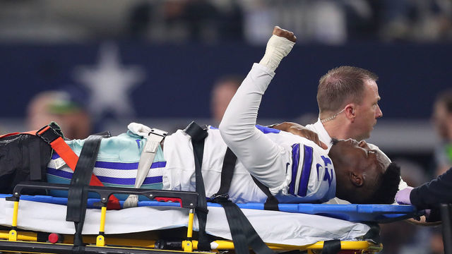 ARLINGTON, TEXAS - JANUARY 05: Allen Hurns #17 of the Dallas Cowboys raides his fist as he is transported off the field after being injured in the first quarter during the Wild Card Round against the Seattle Seahawks at AT&T Stadium on January 05, 2019 in Arlington, Texas.