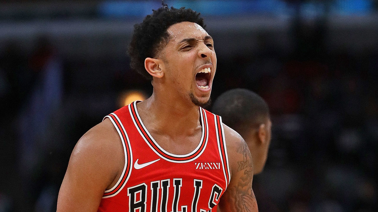 CHICAGO, ILLINOIS - DECEMBER 19: Cameron Payne #22 of the Chicago Bulls celebrates after completing a pass from his back for an assist against the Brooklyn Nets at the United Center on December 19, 2018 in Chicago, Illinois. The Nets defeated the Bulls 96-93.