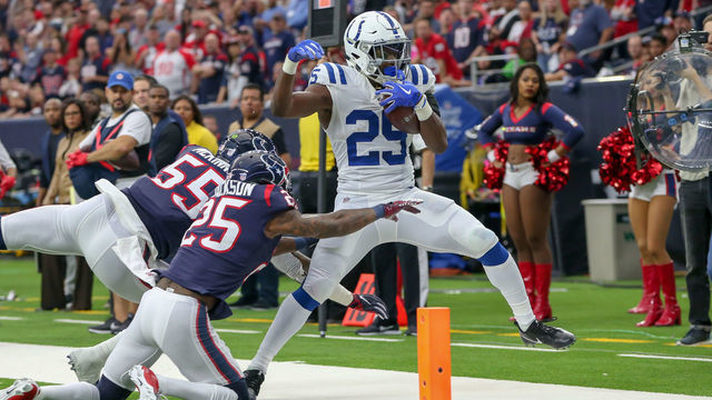 HOUSTON, TX - JANUARY 05: Indianapolis Colts running back Marlon Mack (25) scores a touchdown in the first quarter of the AFC Wild Card game between the Indianapolis Colts and Houston Texans on January 5, 2019 at NRG Stadium in Houston, Texas.