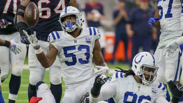 HOUSTON, TX - JANUARY 05: Indianapolis Colts outside linebacker Darius Leonard (53) comes up with the ball after Houston Texans wide receiver DeAndre Hopkins (10) fumbles during the AFC Wild Card game between the Indianapolis Colts and Houston Texans on January 5, 2019 at NRG Stadium in Houston, Texas.