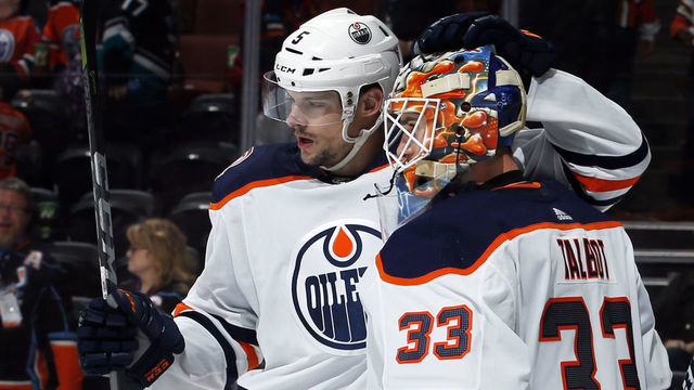 ANAHEIM, CA - JANUARY 6: Kevin Gravel #5 of the Edmonton Oilers congratulates Cam Talbot #33 following their 4-0 win over the Anaheim Ducks on January 6, 2018 at Honda Center in Anaheim, California.