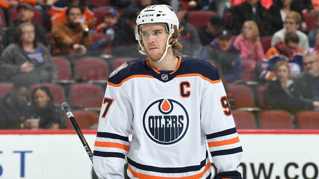 GLENDALE, AZ - JANUARY 02: Connor McDavid #97 of the Edmonton Oilers looks to the bench during a stop in play against the Arizona Coyotes at Gila River Arena on January 2, 2019 in Glendale, Arizona.