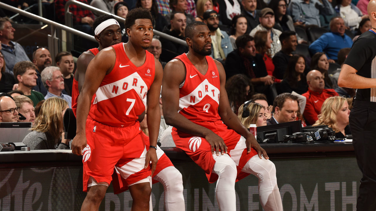 TORONTO, CANADA - JANUARY 6: Kyle Lowry #7 of the Toronto Raptors looks on with Serge Ibaka #9 of the Toronto Raptors during the game against the Indiana Pacers on January 6, 2019 at the Scotiabank Arena in Toronto, Ontario, Canada. Mandatory Copyright Notice: Copyright 2019 NBAE