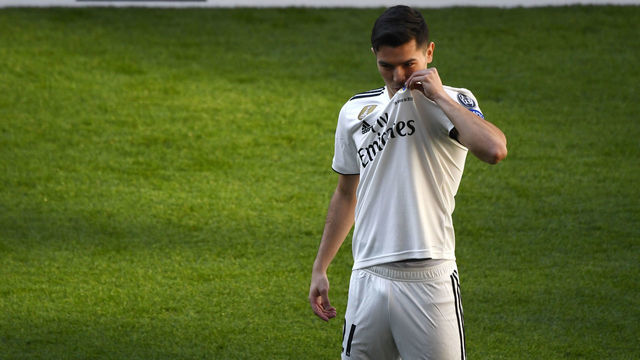 Former Manchester City's Spanish midfielder Brahim Diaz kisses his new jersey's badge during his official presentation as Real Madrid's player at the Santiago Bernabeu stadium in Madrid on January 7, 2019. - Real Madrid have signed the 19-year-old midfielder Brahim Diaz from Manchester City, who has agreed a contract for six and a half years with Real after undergoing a medical check-up today, before being officially unveiled at the Santiago Bernabeu.