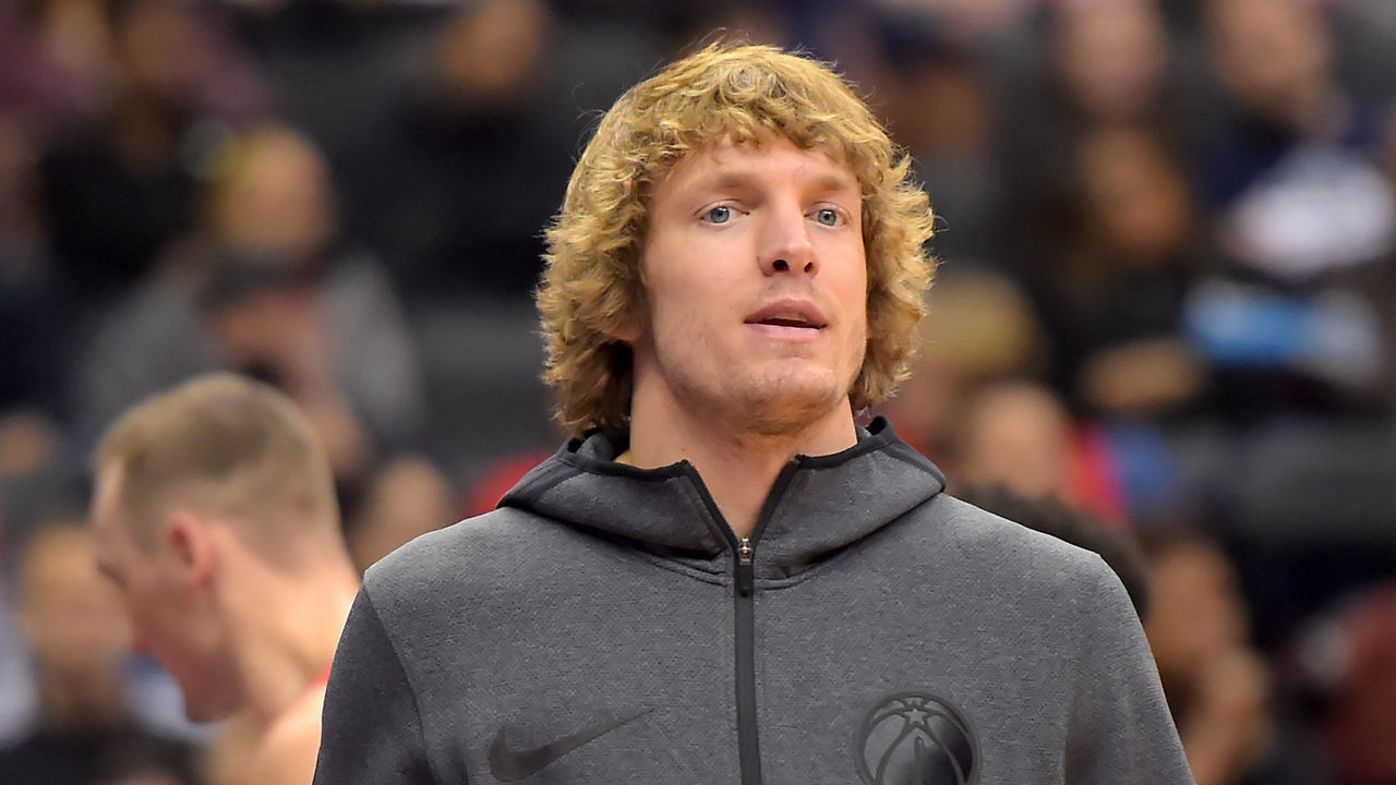 WASHINGTON, DC - DECEMBER 29: Ron Baker #84 of the Washington Wizards looks on during the first half against the Charlotte Hornets at Capital One Arena on December 29, 2018 in Washington, DC.