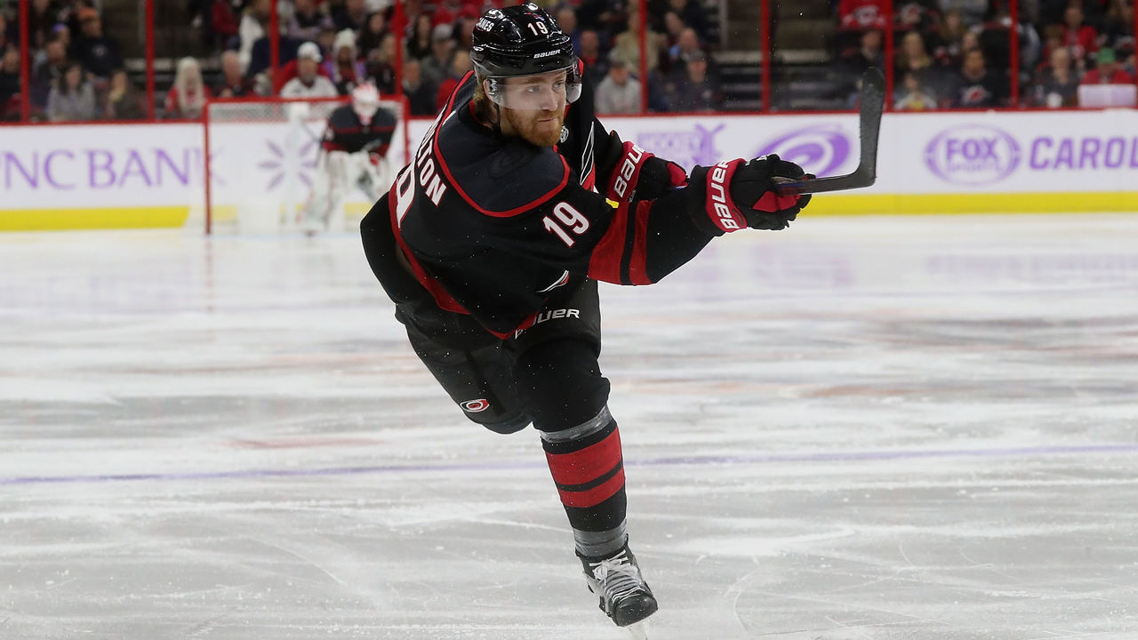 RALEIGH, NC - NOVEMBER 30: Dougie Hamilton #19 of the Carolina Hurricanes shoots the puck during an NHL game against the Anaheim Ducks on November 30, 2018 at PNC Arena in Raleigh, North Carolina.
