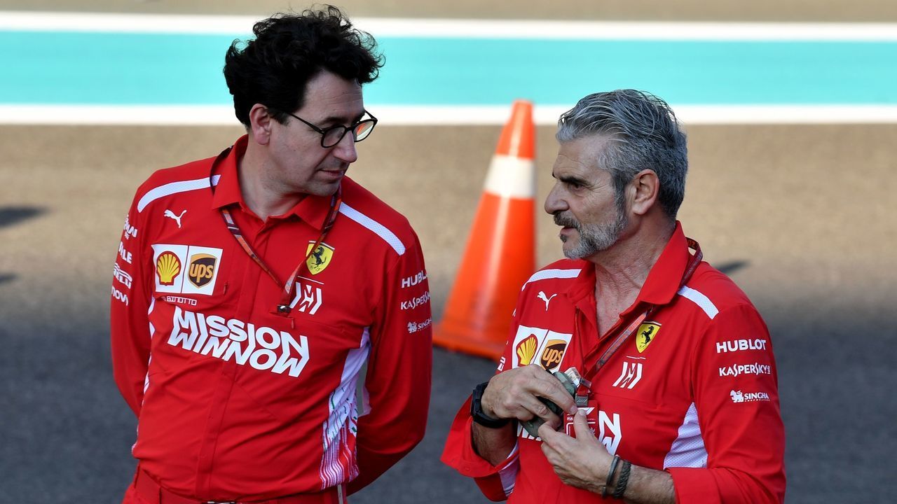 Ferrari Team Principal Maurizio Arrivabene (R) talks to Ferrari technical director Mattia Binotto ahead of the Abu Dhabi Formula One Grand Prix at the Yas Marina circuit on November 22, 2018.