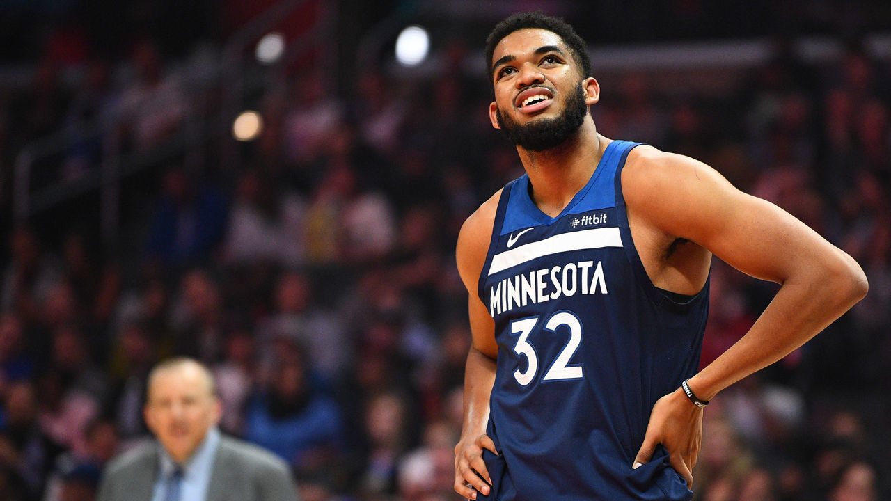 LOS ANGELES, CA - NOVEMBER 05: Minnesota Timberwolves Center Karl-Anthony Towns (32) looks on with head coach Tom Thibodeau in the background during a NBA game between the Minnesota Timberwolves and the Los Angeles Clippers on November 5, 2018 at STAPLES Center in Los Angeles, CA.