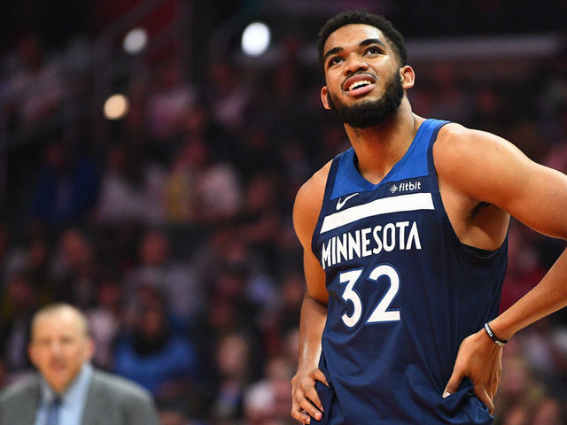 LOS ANGELES, CA - NOVEMBER 05: Minnesota Timberwolves Center Karl-Anthony Towns (32) looks on with head coach Tom Thibodeau in the background during a NBA game between the Minnesota Timberwolves and the Los Angeles Clippers on November 5, 2018 at STAPLES Center in Los Angeles, CA.