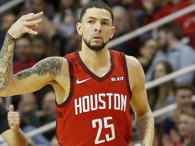 HOUSTON, TX - DECEMBER 27: Austin Rivers #25 of the Houston Rockets celebrates after a three point shot in the first half against the Boston Celtics at Toyota Center on December 27, 2018 in Houston, Texas.