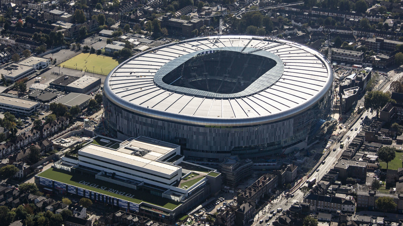 LONDON, ENGLAND. OCTOBER 2018. Aerial view of the new home stadium of Tottenham Hotspur football club on October 9th 2018. This state-of-the-art stadium is located 7 miles north of the city of London, between High Road and Worcester Avenue in the Borough of Haringey. Aerial Photograph by David Goddard