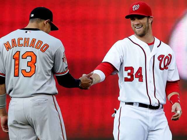 July 07 2014: Washington Nationals left fielder Bryce Harper (34) greets Baltimore Orioles third base Manny Machado (13) before a MLB game at Nationals Park, in Washington D.C.