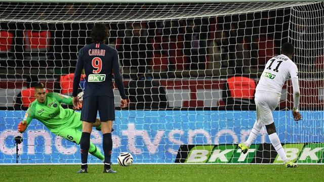 Guingamp's French forward Marcus Thuram (R) shoots and scores a penaty kick past Paris Saint-Germain's French goalkeeper Alphonse Areola (L) during the French League Cup quarter-final football match between Paris Saint-Germain (PSG) and Guingamp (EAG) on January 9, 2019, at the Parc des Princes stadium in Paris.