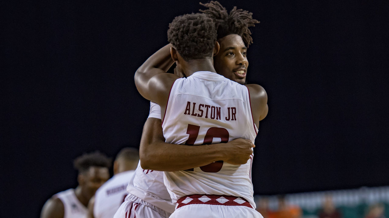 ATLANTIC CITY, NJ - DECEMBER 15: Temple Owls guard Quinton Rose (1) and guard Shizz Alston Jr. (10) celebrate during overtime of the college basketball game between the Temple Owls and Davidson Wildcats on December 15, 2018, at Boardwalk Hall in Atlantic City, NJ