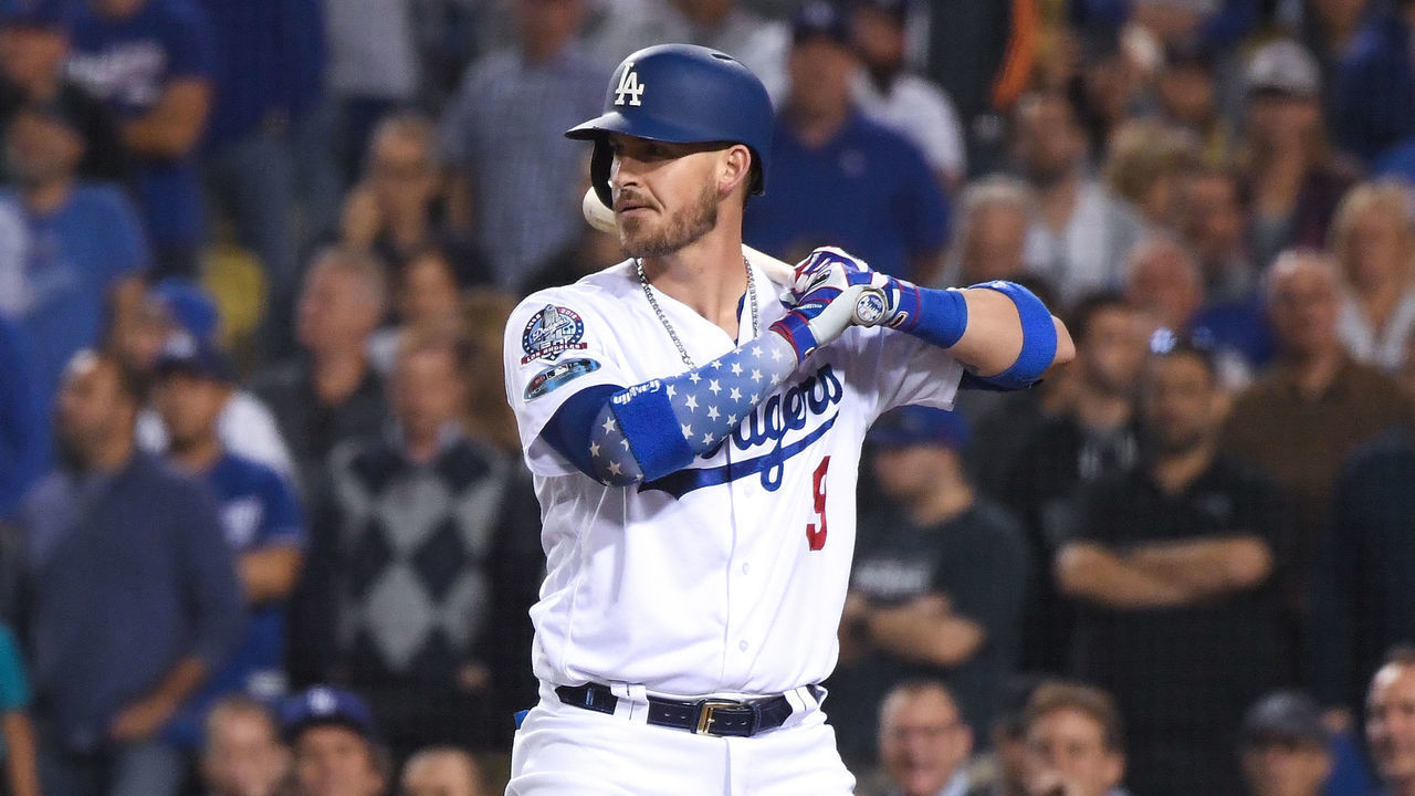 LOS ANGELES, CA - OCTOBER 16: Yasmani Grandal #9 of the Los Angeles Dodgers at bat in the eleventh inning against the Milwaukee Brewers in Game Four of the National League Championship Series at Dodger Stadium on October 16, 2018 in Los Angeles, California.