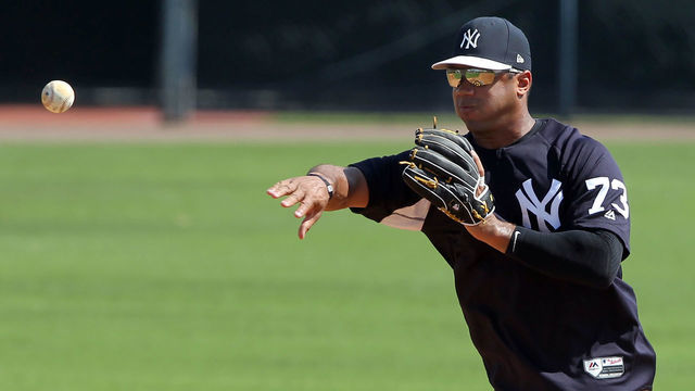 TAMPA, FL - MAR 01: Russell Wilson (73) makes the throw over to first base to complete the double play during the New York Yankees spring training workout on March 01, 2018, at George M. Steinbrenner Field in Tampa, FL. Wilson, who is the Seattle Seahawks starting quarterback is in Yankees camp working out with the major league team.