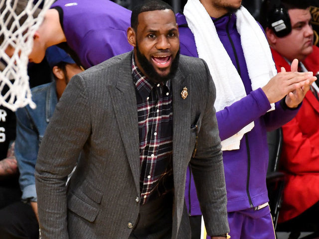 LOS ANGELES, CALIFORNIA - JANUARY 09: Injured LeBron James cheers on his teammates during a basketball game between the Los Angeles Lakers and the Detroit Pistons at Staples Center on January 09, 2019 in Los Angeles, California.