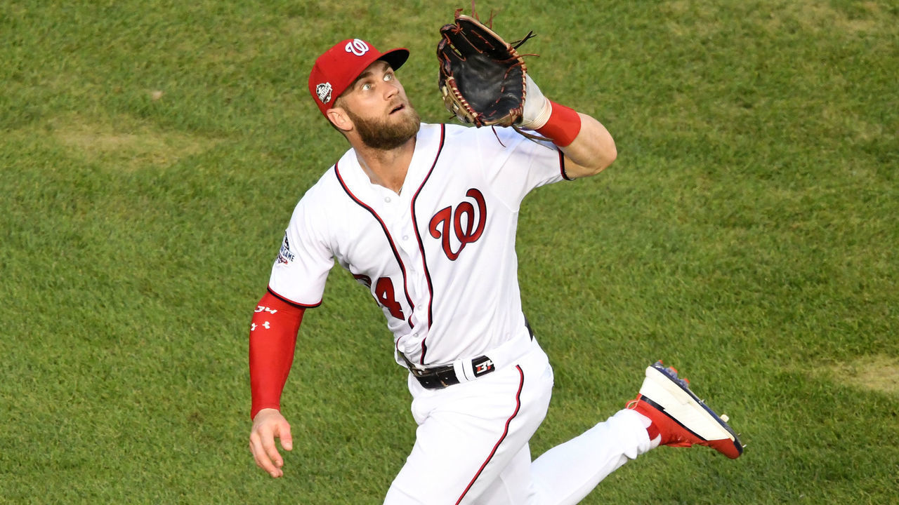 WASHINGTON, DC - AUGUST 08: Bryce Harper #34 of the Washington Nationals runs to catch a fly ball during a baseball game against the Atlanta Braves at Nationals Park on August 8, 2018 in Washington, DC.