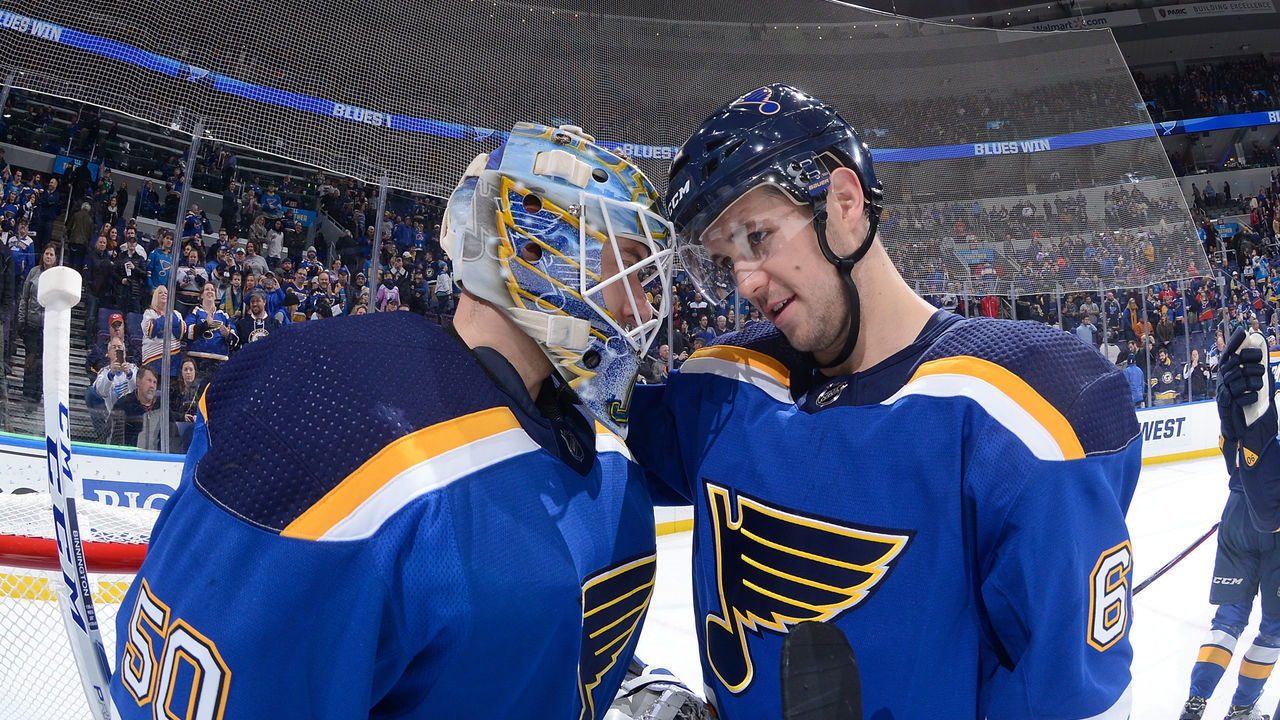 ST. LOUIS, MO - JANUARY 10: Mackenzie MacEachern #62 of the St. Louis Blues congratulates Jordan Binnington #50 of the St. Louis Blues after beating the Montreal Canadiens 4-1 at Enterprise Center on January 10, 2019 in St. Louis, Missouri.