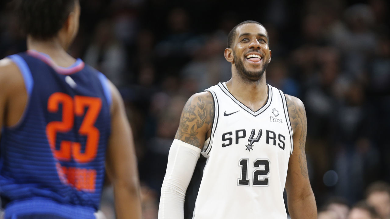 SAN ANTONIO, TX - JANUARY 10: LaMarcus Aldridge #12 of the San Antonio Spurs is all smiles after they defeated the Oklahoma City Thunder in double overtime at AT&T Center on January 10, 2019 in San Antonio, Texas. NOTE TO USER: User expressly acknowledges and agrees that , by downloading and or using this photograph, User is consenting to the terms and conditions of the Getty Images License Agreement.
