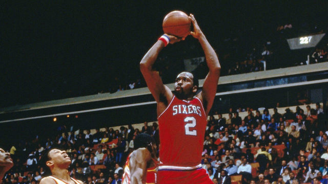 ATLANTA - 1983: Moses Malone #2 of the Philadelphia 76'ers takes a jumper against the Atlanta Hawks during a game in the 1983 NBA season at The Omni in Atlanta, Georgia. NOTE TO USER: User expressly acknowledges and agrees that, by downloading and/or using this Photograph, user is consenting to the terms and conditions of the Getty Images License Agreement. Mandatory Copyright Notice: Copyright 1983 NBAE
