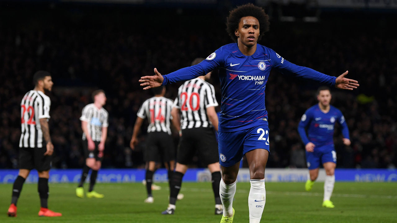 LONDON, ENGLAND - JANUARY 12: Willian of Chelsea celebrates after scoring his team's second goal during the Premier League match between Chelsea FC and Newcastle United at Stamford Bridge on January 12, 2019 in London, United Kingdom.