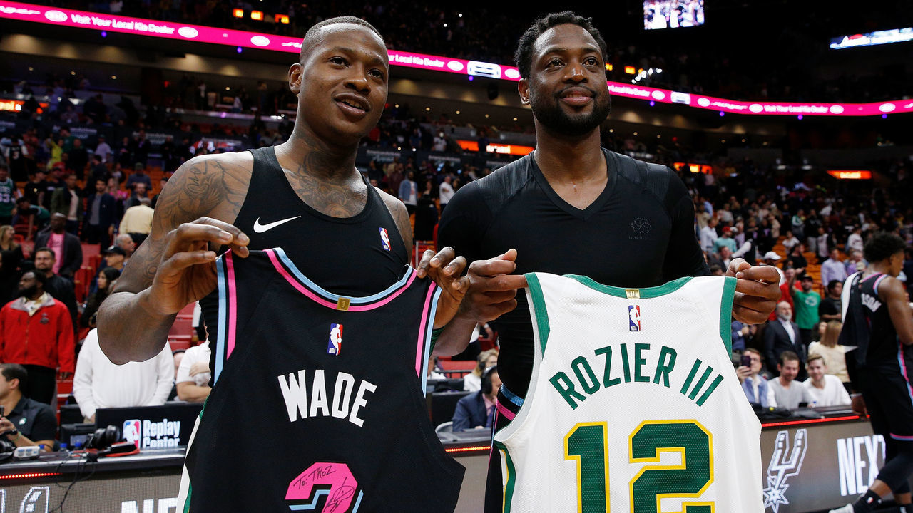 MIAMI, FL - JANUARY 10: Dwyane Wade #3 of the Miami Heat exchanges jerseys with Terry Rozier #12 of the Boston Celtics after the game at American Airlines Arena on January 10, 2019 in Miami, Florida.