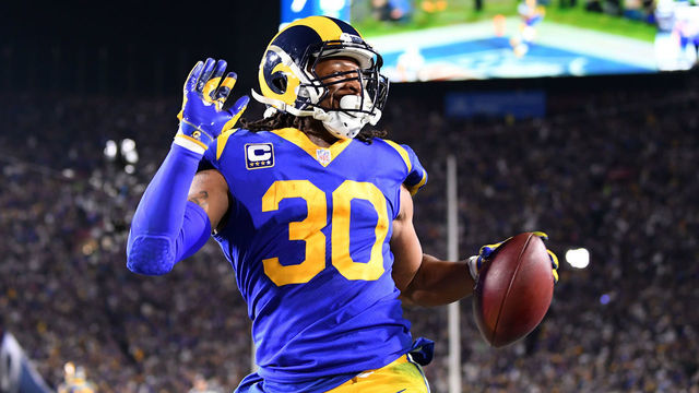 LOS ANGELES, CA - JANUARY 12: Todd Gurley #30 of the Los Angeles Rams scores a 35 yard touchdown in the second quarter against the Dallas Cowboys in the NFC Divisional Playoff game at Los Angeles Memorial Coliseum on January 12, 2019 in Los Angeles, California.