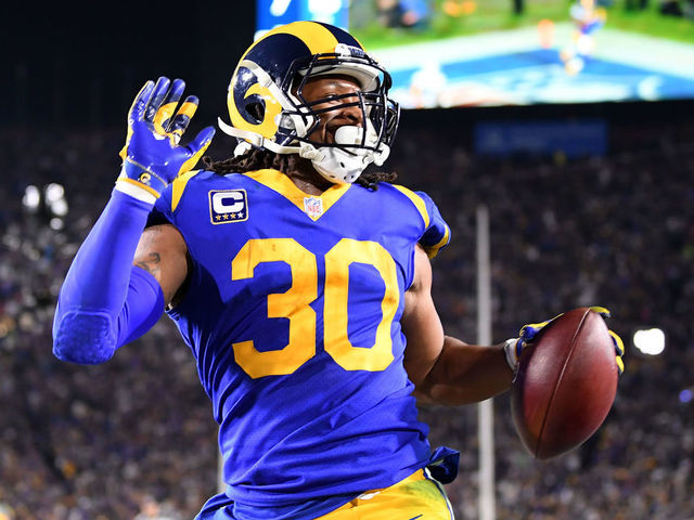 LOS ANGELES, CA - JANUARY 12: Todd Gurley #30 of the Los Angeles Rams scores a 35 yard touchdown in the second quarter against the Dallas Cowboys in the NFC Divisional Playoff game at Los Angeles Memorial Coliseum on January 12, 2019 in Los Angeles, California.
