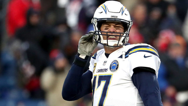 FOXBOROUGH, MASSACHUSETTS - JANUARY 13: Philip Rivers #17 of the Los Angeles Chargers reacts during the fourth quarter in the AFC Divisional Playoff Game against the New England Patriots at Gillette Stadium on January 13, 2019 in Foxborough, Massachusetts.
