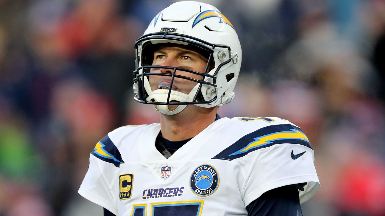 FOXBOROUGH, MASSACHUSETTS - JANUARY 13: Philip Rivers #17 of the Los Angeles Chargers reacts during the fourth quarter in the AFC Divisional Playoff Game against the New England Patriots at Gillette Stadium on January 13, 2019 in Foxborough, Massachusetts.
