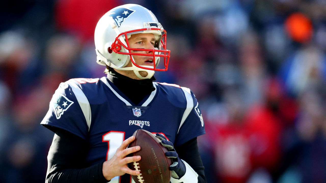 FOXBOROUGH, MASSACHUSETTS - JANUARY 13: Tom Brady #12 of the New England Patriots looks to throw during the first quarter in the AFC Divisional Playoff Game against the Los Angeles Chargers at Gillette Stadium on January 13, 2019 in Foxborough, Massachusetts.