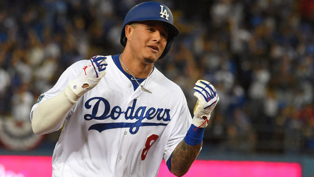 LOS ANGELES, CA - OCTOBER 05: Manny Machado #8 of the Los Angeles Dodgers celebrates his 2nd inning 2-run homer in game two of the NLDS at Dodger Stadium on Friday, October 5, 2018 in in Los Angeles, California.